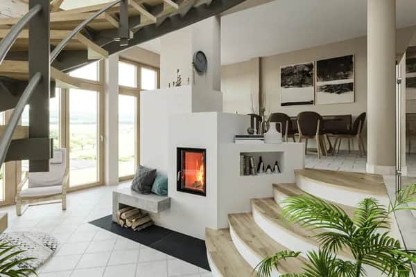 Architektonisches Meisterwerk: Moderner Kachelofen mit Sitzbank in luftigem Wohnraum